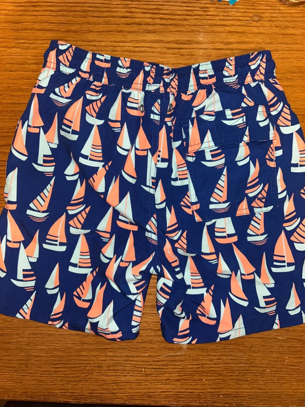Boys Tom & Teddy Navy Swim Trunks with Coral and Light Blue Sailboat Motif
